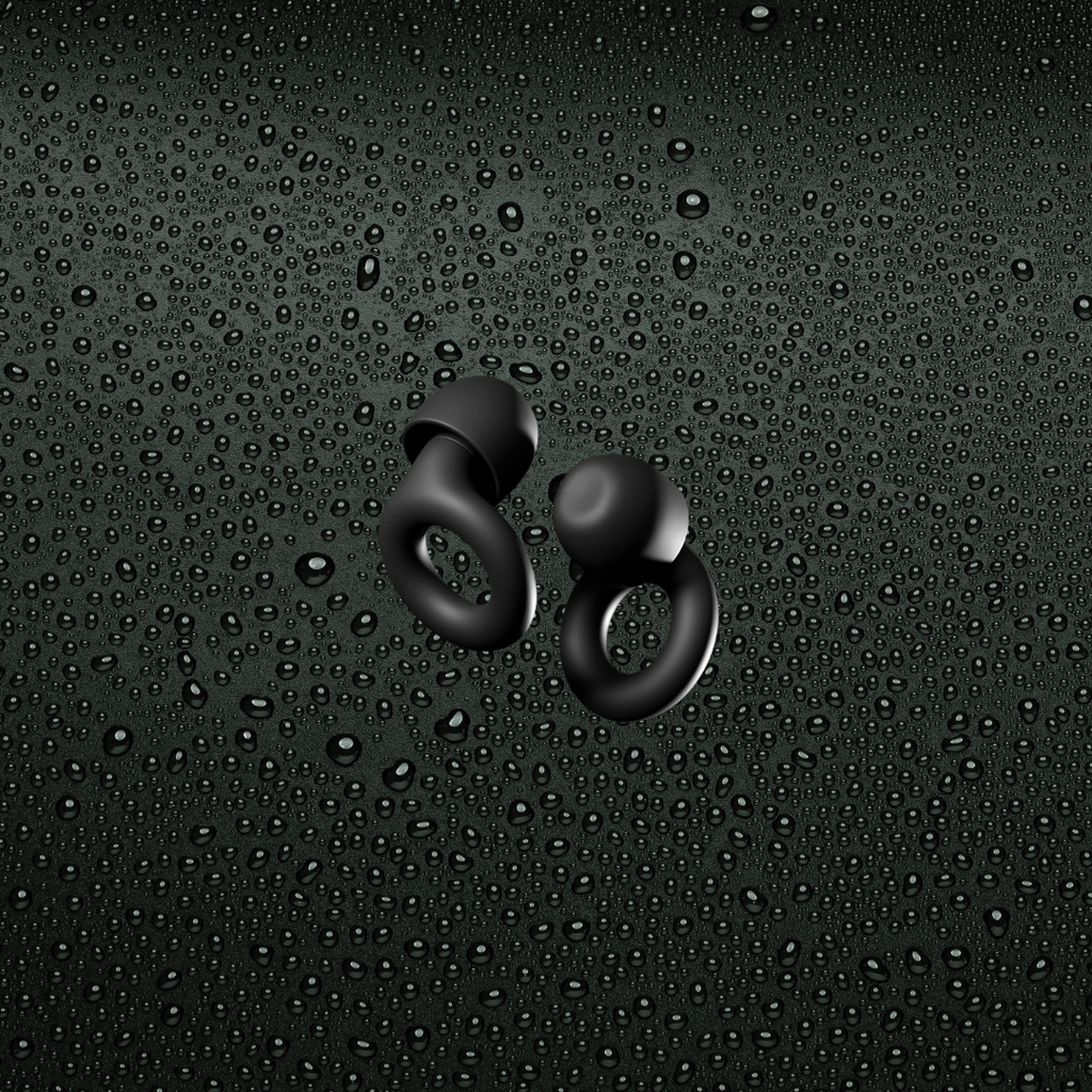 Black ear plugs with black background with water droplets-Mularx